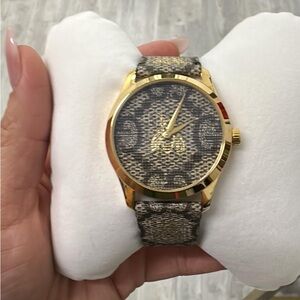 Gucci Gold-Tone Watch with Brown Patterned Fabric Strap